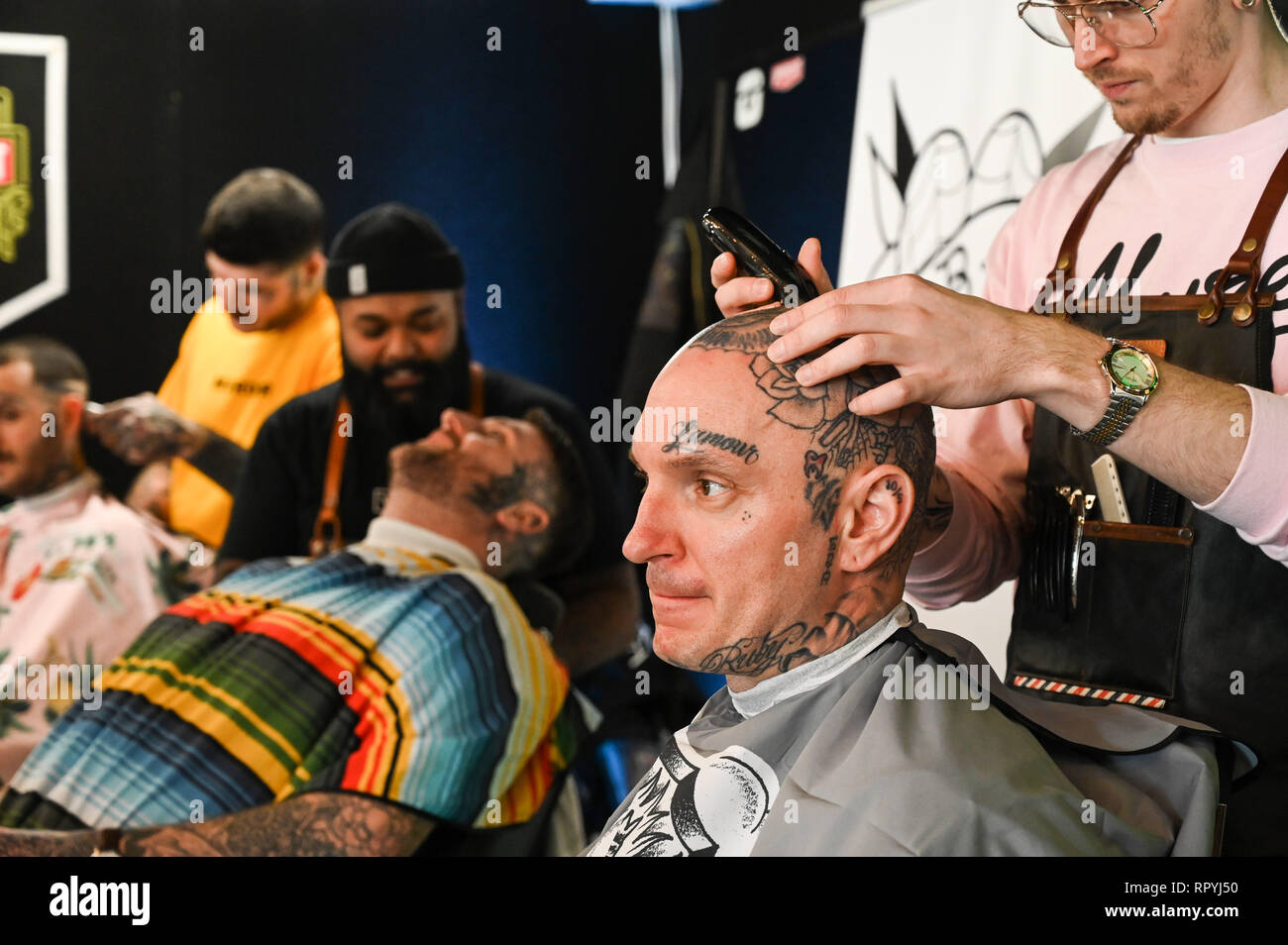 Face Tattooed guest with Gucci whool mask - StreetStyle at Louis Vuitton -  Paris Fashion Week Men F/W 2019-2020 Stock Photo - Alamy