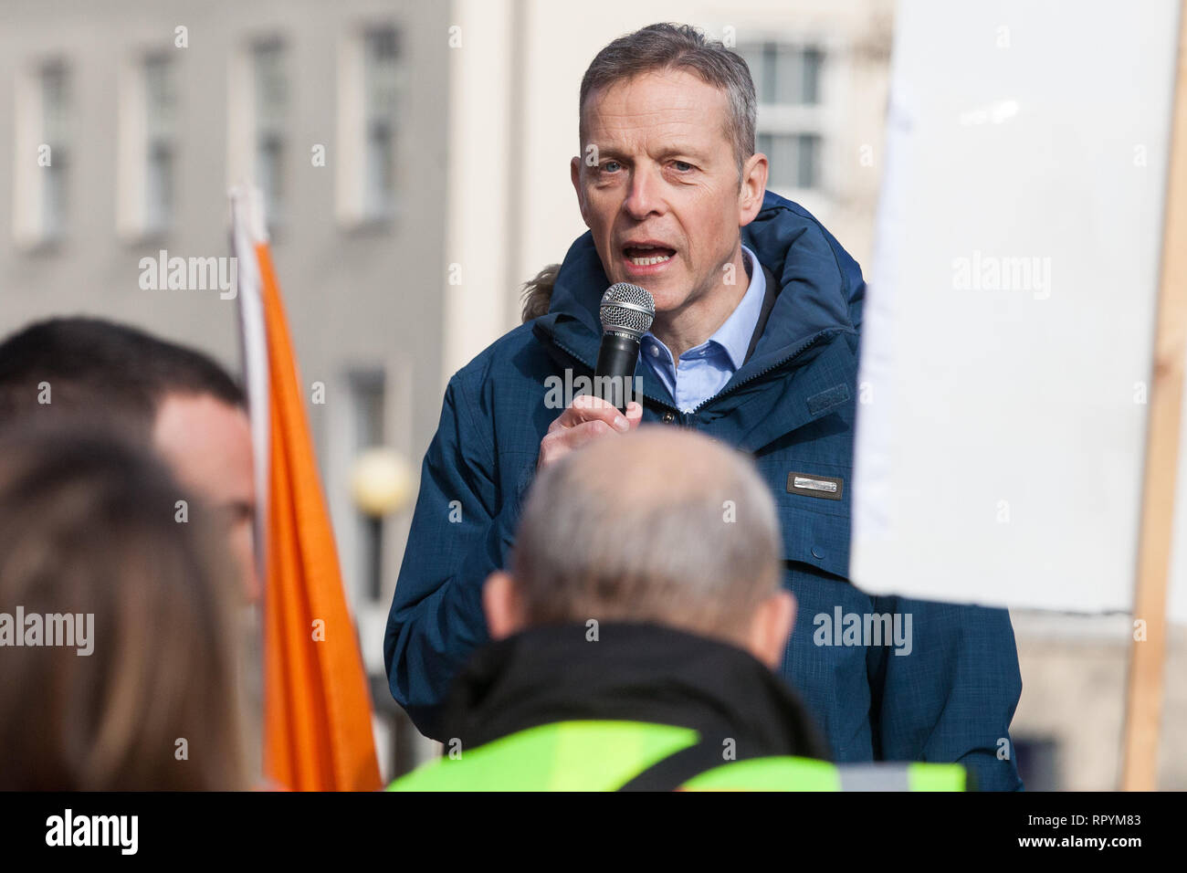 Maidenhead, Berkshire, UK. 23rd February, 2019. Matt Rodda, Labour MP for Reading East, addresses members of the Windsor and Maidenhead branches of the Labour Party and UNISON and GMB trade unions at a protest outside Maidenhead Town Hall in Prime Minister Theresa May's constituency against planned spending cuts of £6.8m to the 2019/2020 budget by the Royal Borough of Windsor and Maidenhead. Over 1,000 people had signed a petition to the council demanding an alternative to the cuts. Credit: Mark Kerrison/Alamy Live News Stock Photo