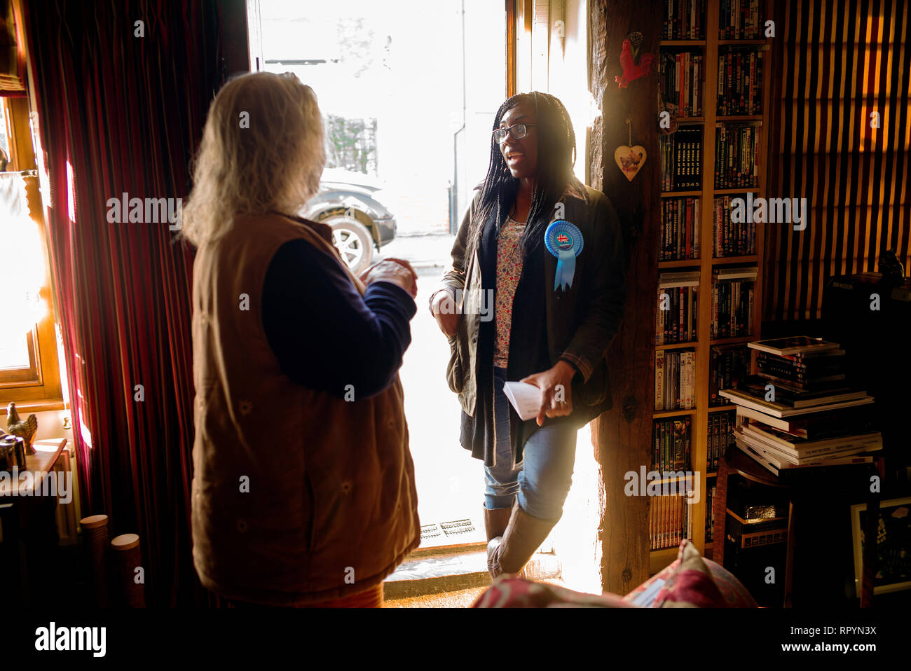 Thaxted, Essex, England. 23rd February 2019. Kemi Badenoch Conservative MP for Saffron Walden Essex UK campaigning for two local council candidates in the Uttlesford District Council ( UDC ) election to be held on 2 May 2019. She is seen here talking to local resident Nicola Bertoya about issues of concern such as speeding motorists in the area.  Olukemi Olufunto Badenoch (née Adegoke; born January 1980)is a British Conservative politician and Member of Parliament for Saffron Walden. Adegoke was born in Wimbledon, London to parents of Nigerian origin. Credit: BRIAN HARRIS/Alamy Live News Stock Photo