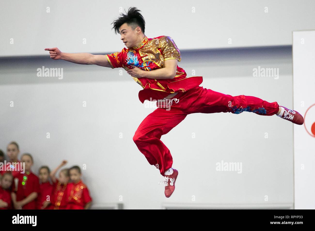 Moscow, Russia. 23rd Feb, 2019. A competitor performs during the opening ceremony for the Moscow Wushu Stars 2019 competition in Moscow, Russia, on Feb. 23, 2019. Credit: Bai Xueqi/Xinhua/Alamy Live News Stock Photo