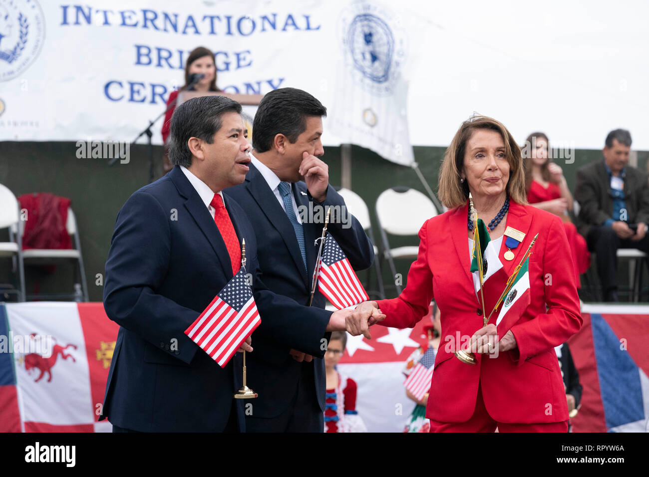 United States House of Representatives Speaker Nancy Pelosi, with National Institute of Migration commissioner Dr. Tonatiuh Guillen Lopez (red tie) and Francisco Javier Garcia Cabeza de Vaca (blue tie), governor of the Mexican state of Tamaulipas, participate in the abrazo (friendship) ceremony on the Juarez Lincoln international bridge between Laredo, Texas, and Nuevo Laredo in Tamaulipas during Laredo's annual Washington's Birthday celebration. Stock Photo