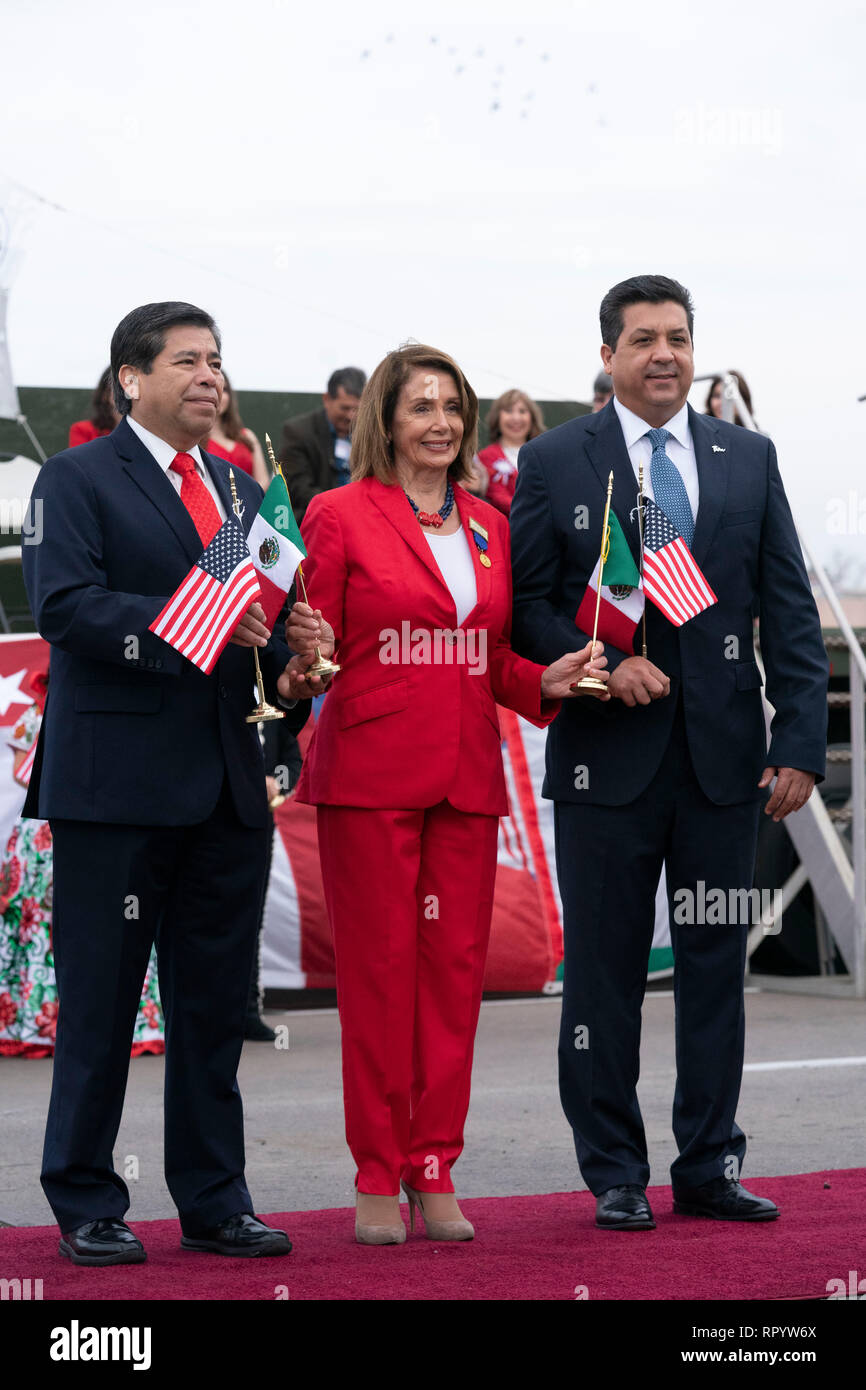 United States House of Representatives Speaker Nancy Pelosi, with National Institute of Migration commissioner Dr. Tonatiuh Guillen Lopez (red tie) and Francisco Javier Garcia Cabez de Vaca (blue tie), governor of the Mexican state of Tamaulipas, participate in the abrazo (friendship) ceremony on the Juarez Lincoln international bridge between Laredo, Texas, and Nuevo Laredo in Tamaulipas during Laredo's annual Washington's Birthday celebration. Stock Photo