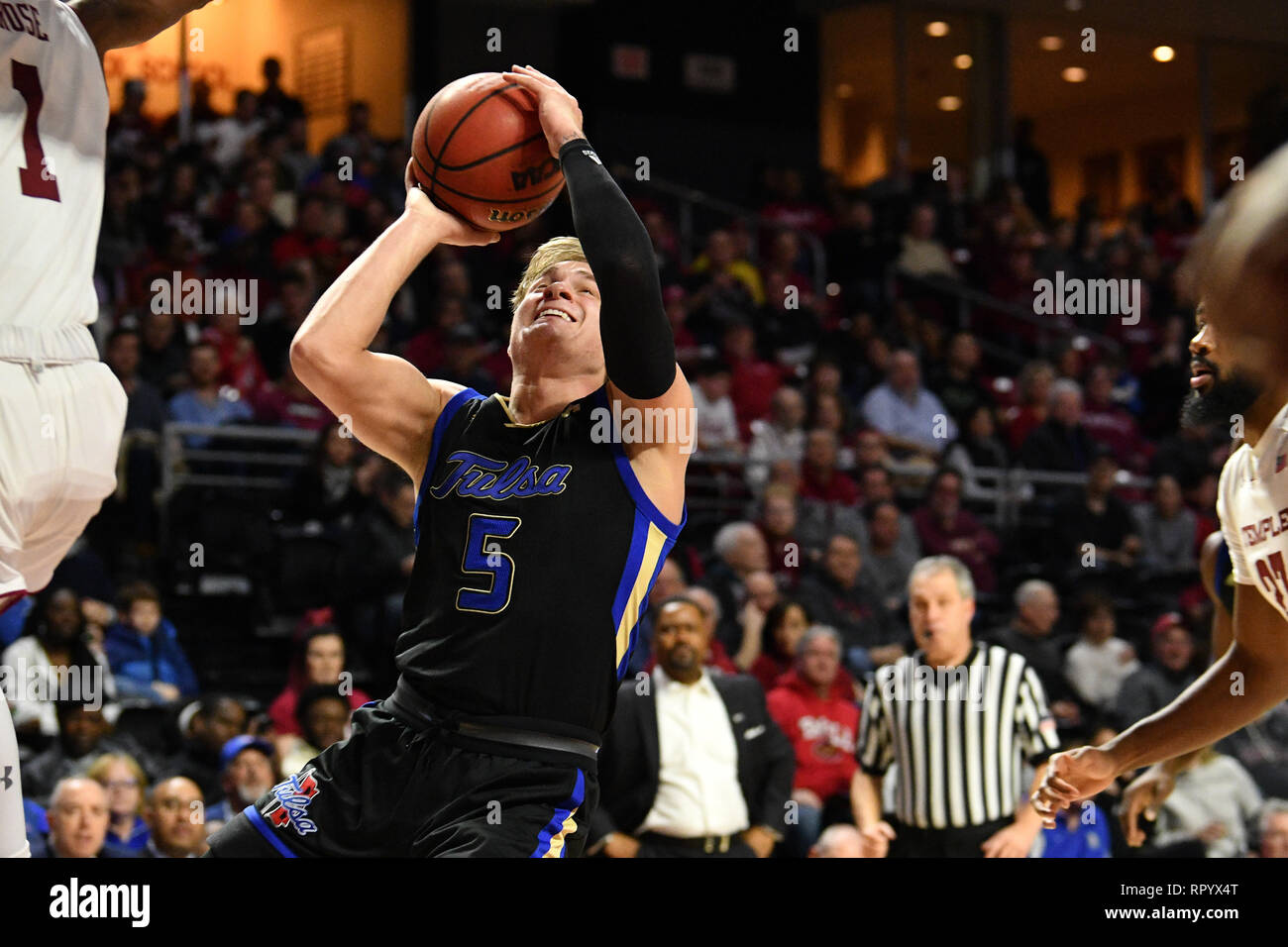 Philadelphia, Pennsylvania, USA. 23rd Feb, 2019. Tulsa Golden Hurricane guard LAWSON KORITA (5) drives to the basket during the American Athletic Conference basketball game played at the Liacouras Center in Philadelphia. Temple beat Tulsa 84-73. Credit: Ken Inness/ZUMA Wire/Alamy Live News Stock Photo