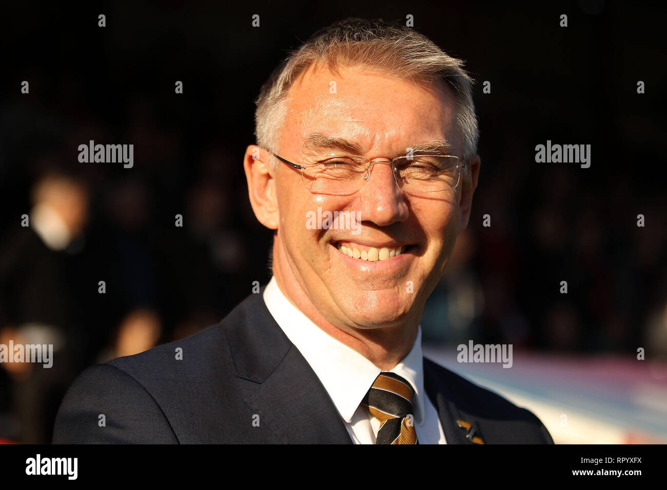 London, UK. 23rd Feb, 2019. Hull City Manager Nigel Adkins cracks a smile as he looks on. Griffin Park on Saturday 23rd February 2019 . this image may only be used for Editorial purposes. Editorial use only, license required for commercial use. No use in betting, games or a single club/league/player publications. pic by Steffan Bowen/Andrew Orchard sports photography/Alamy Live news Credit: Andrew Orchard sports photography/Alamy Live News Stock Photo