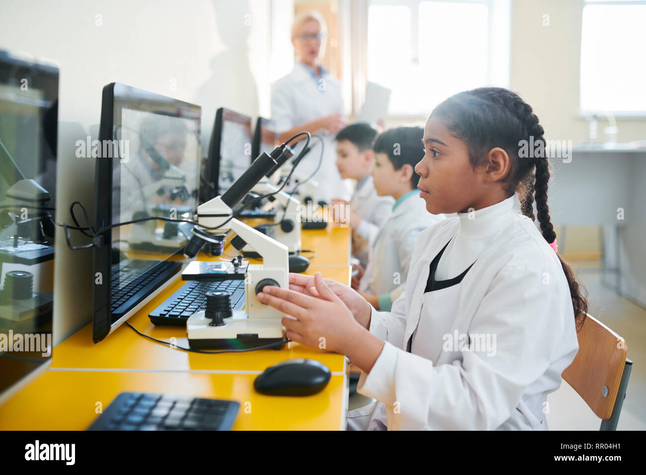 Studying in lab Stock Photo