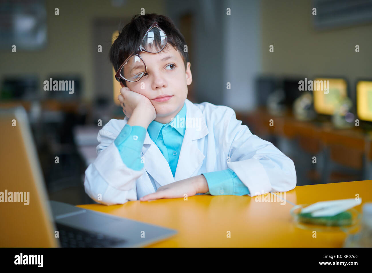 Schoolboy in whitecoat Stock Photo