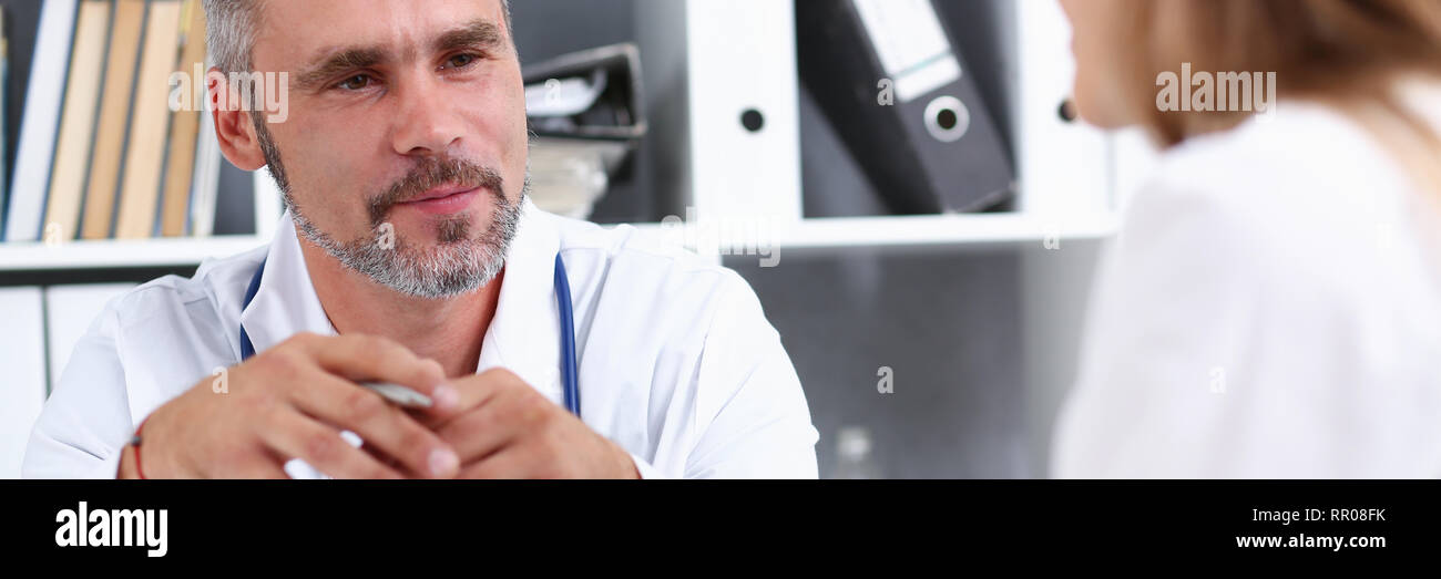 Mature male doctor talk hi-res stock photography and images - Alamy