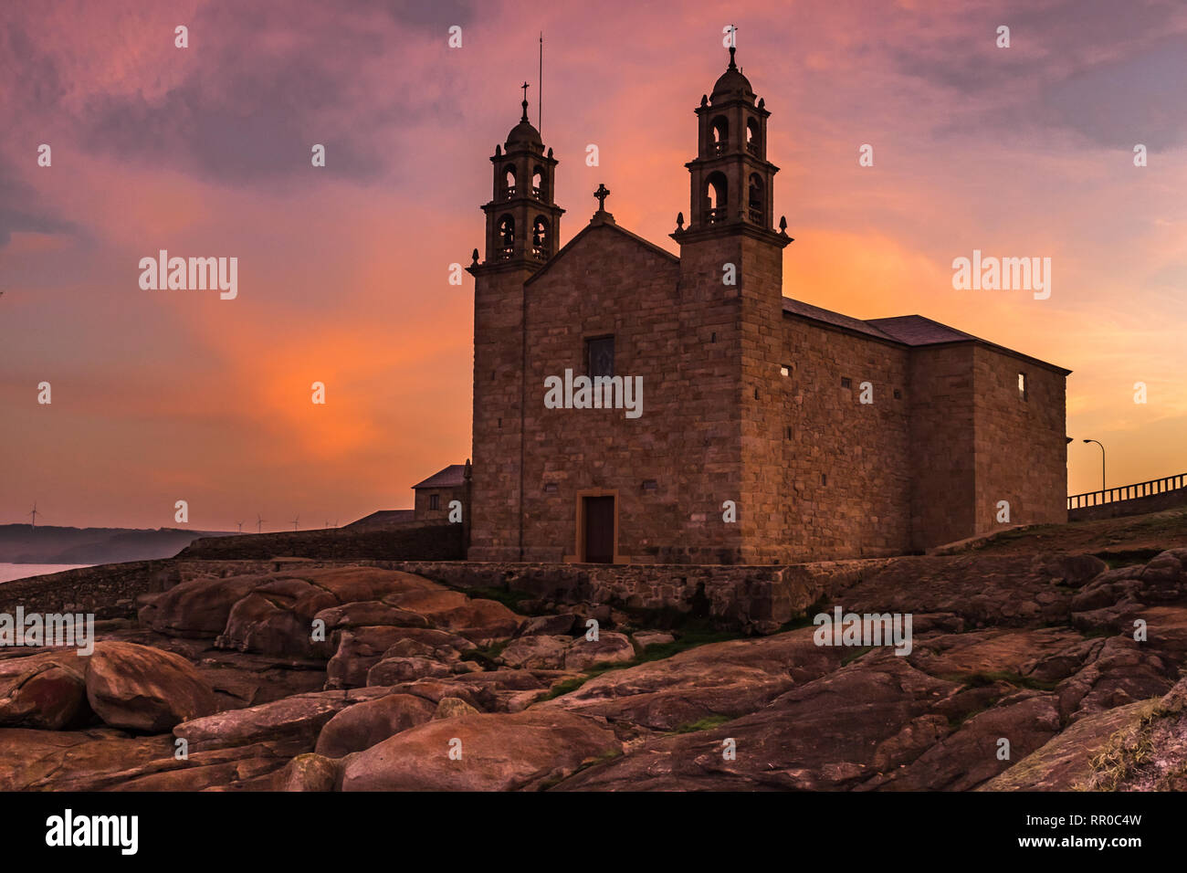 The Church Of Virgen De La Barca Muxia Galicia Spain Shot At Sunset Lots Of Orange And 