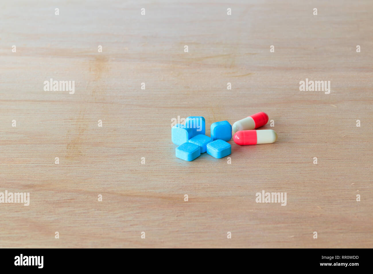 Pills Blue And Capsule On Wooden Floor With Copy Space Add Text