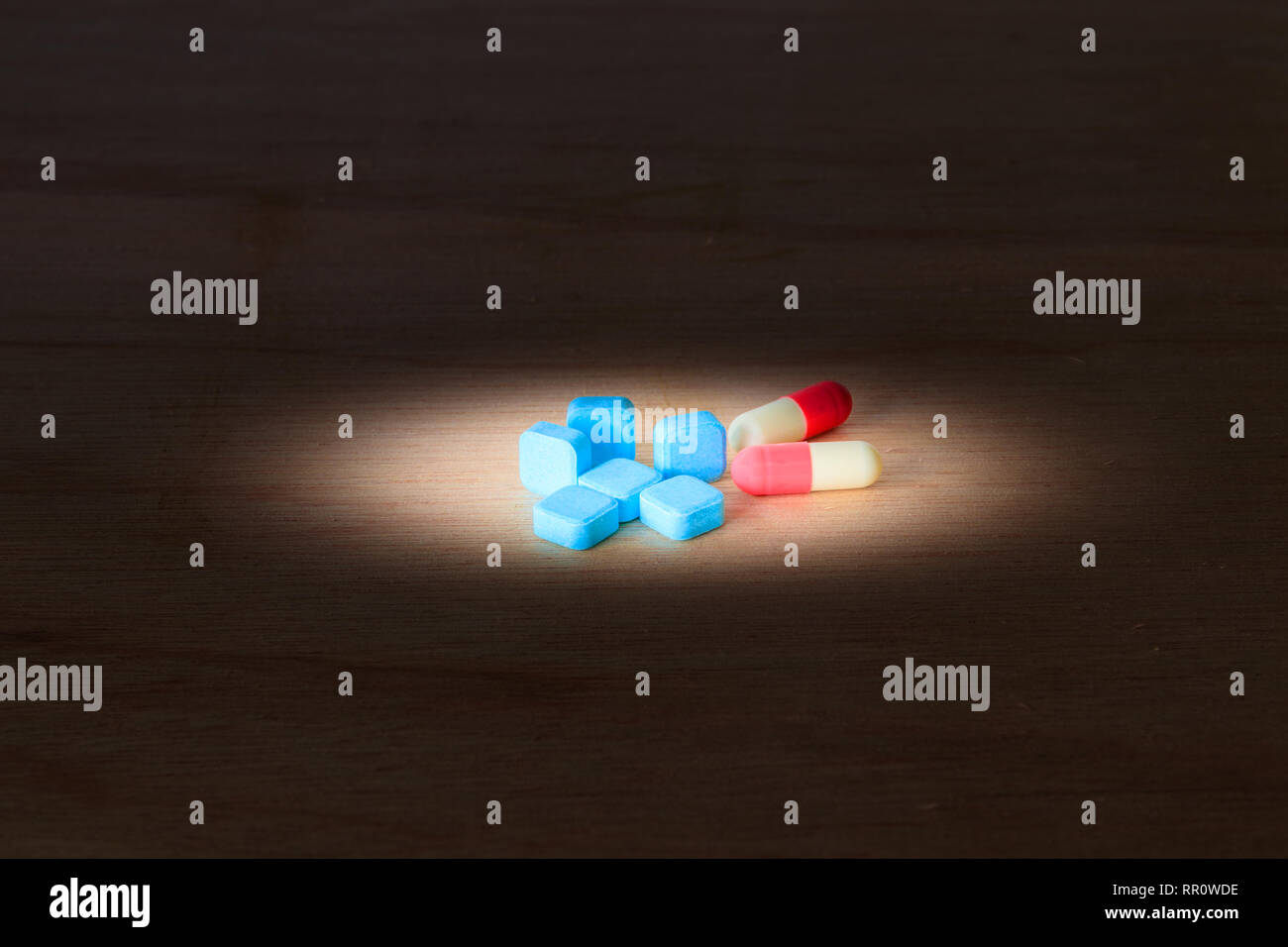 Pills Blue And Capsule On Wooden Floor With Copy Space Add Text