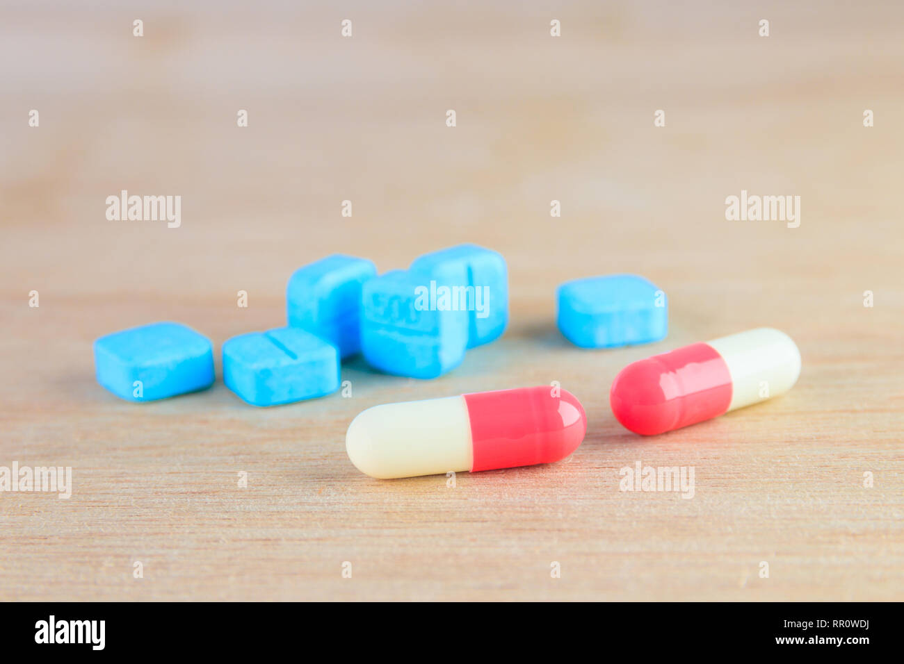 Pills Capsule On Wooden Floor With Copy Space Add Text High