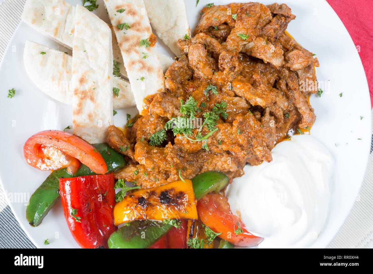 Iskender kebab, a popular traditional street food of Istanbul, Turkey Stock Photo