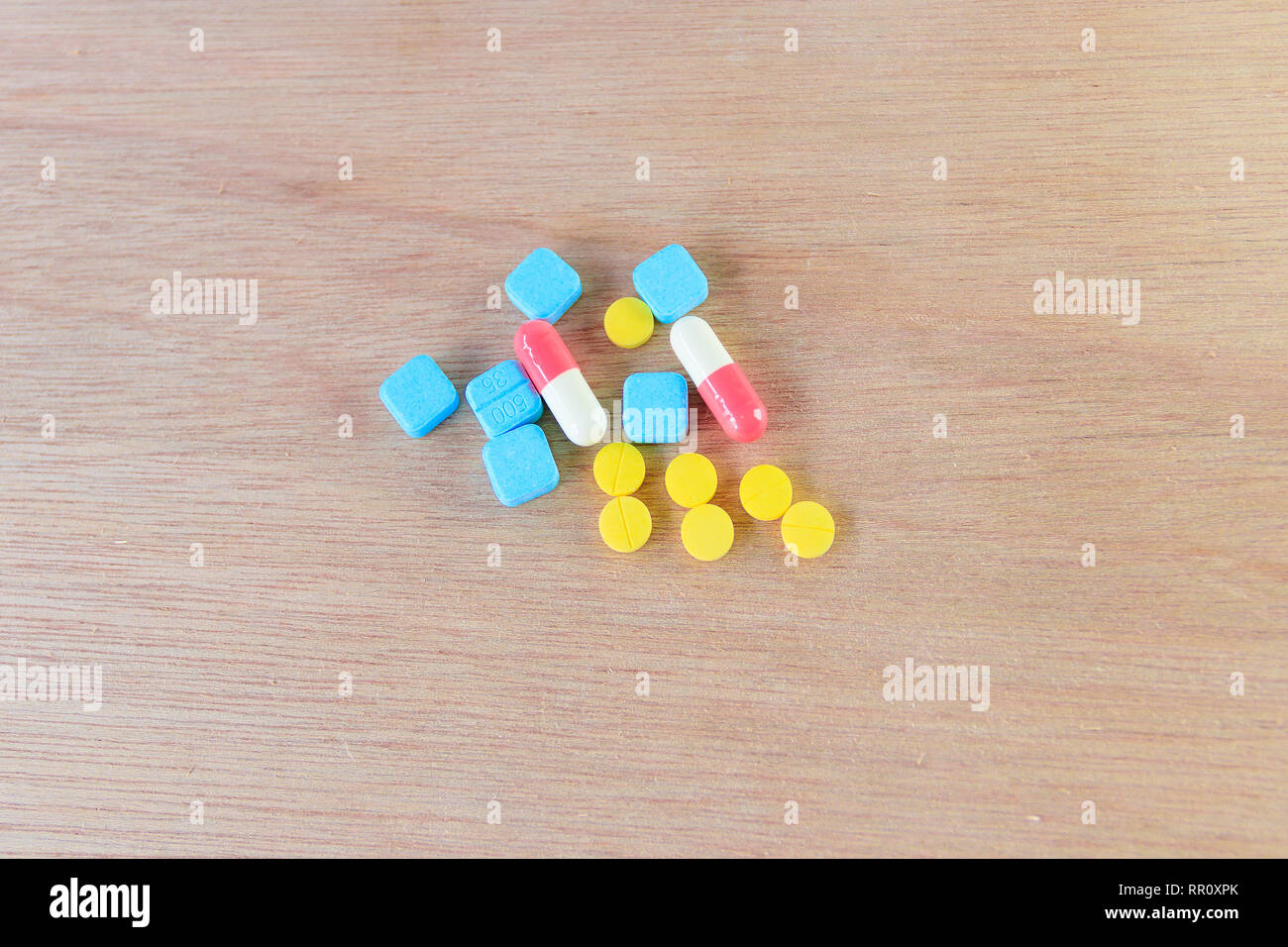 Pills And Capsule On Wooden Floor With Copy Space Add Text High