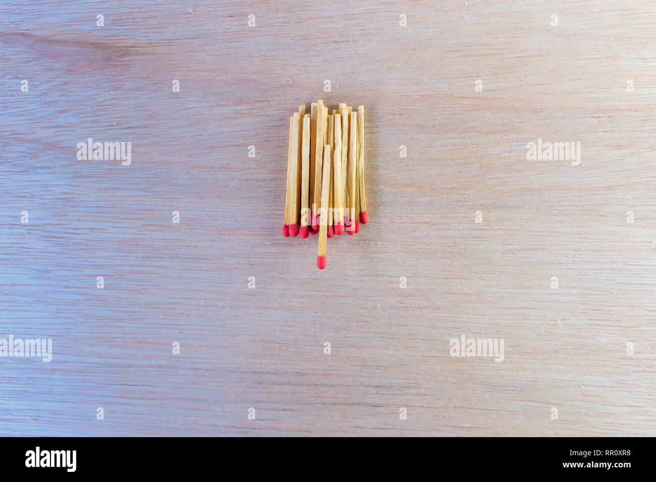 Red Head Stack match stalk with red head concept energy old vintage on wooden floor ...
