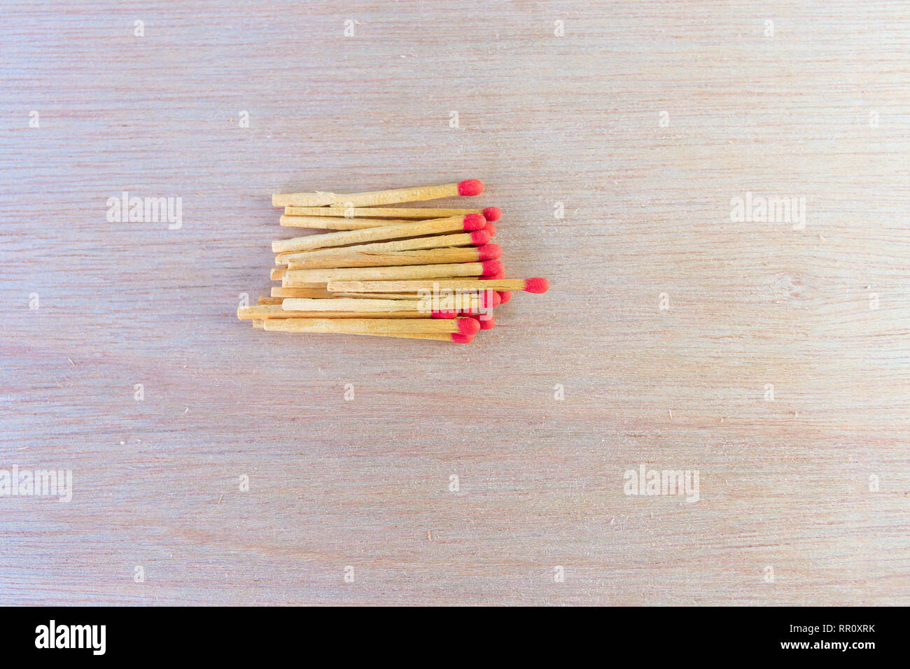 Red Head Stack match stalk with red head concept energy old vintage on wooden floor ...