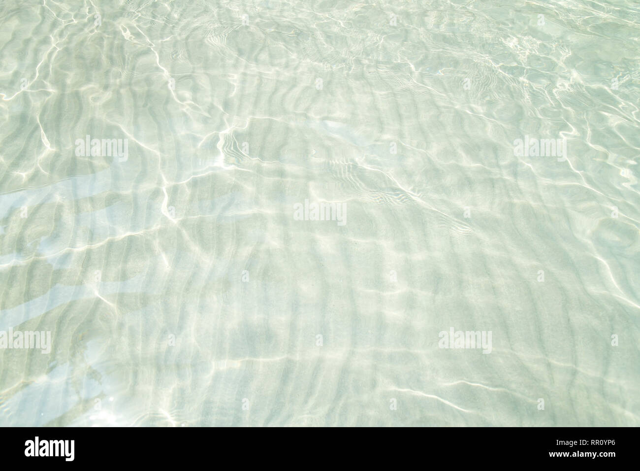 Wavy sand in a sea water Stock Photo