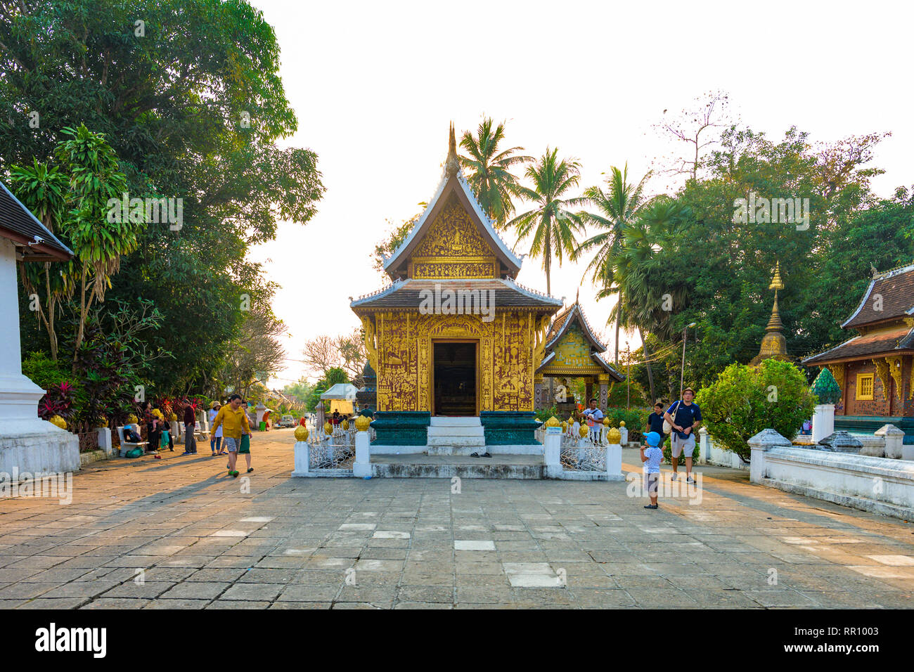 Close-up view of the beautiful Wat Xieng Thong (Golden City Temple) at sunset in Luang Prabang, Laos. Wat Xieng Thong is one of the most important of Stock Photo