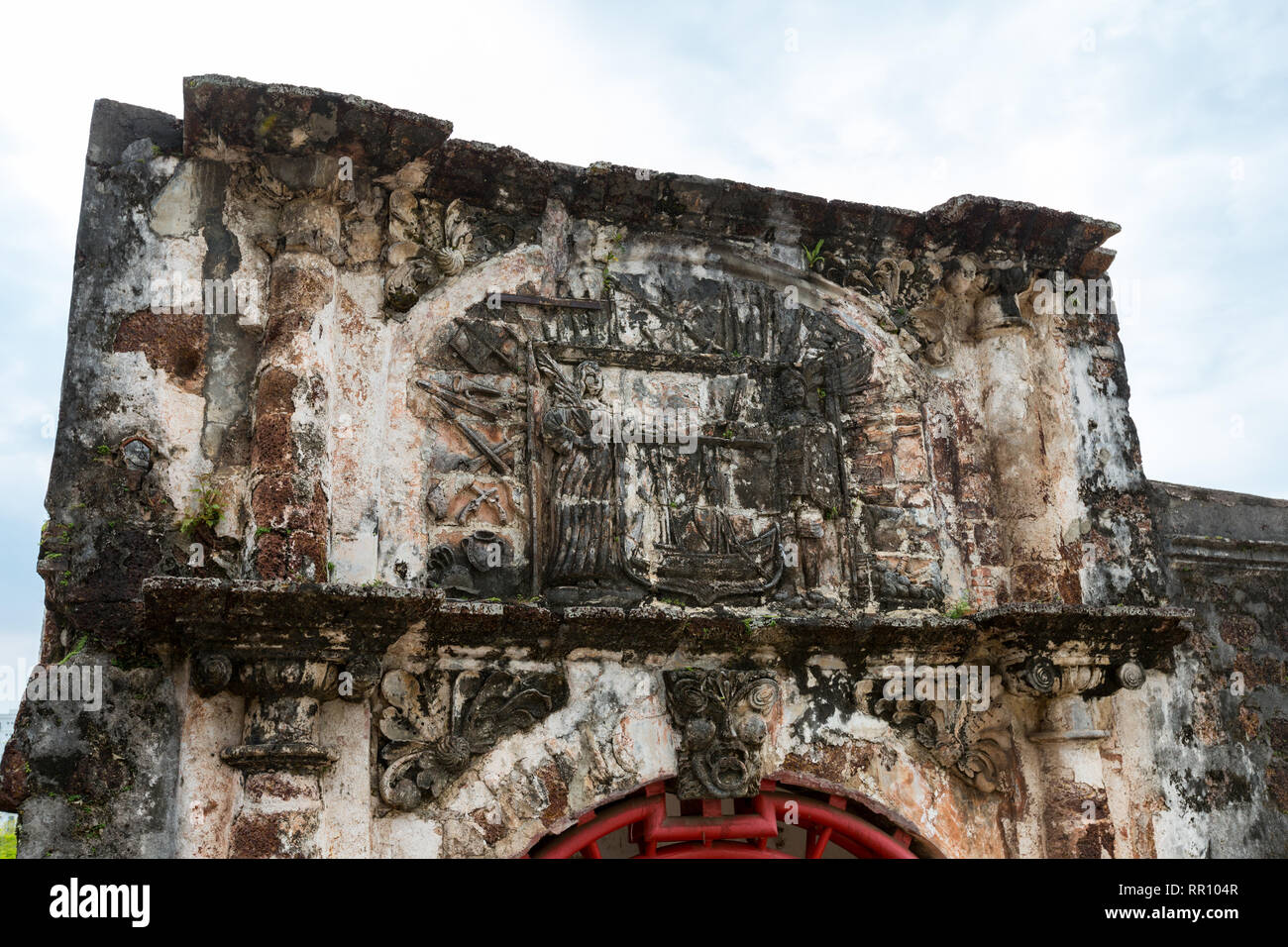 Coat of Arms Atop Porta de Santiago, Gate of A Famosa Portuguese Fort, 16th. Century, Melaka, Malaysia. Stock Photo