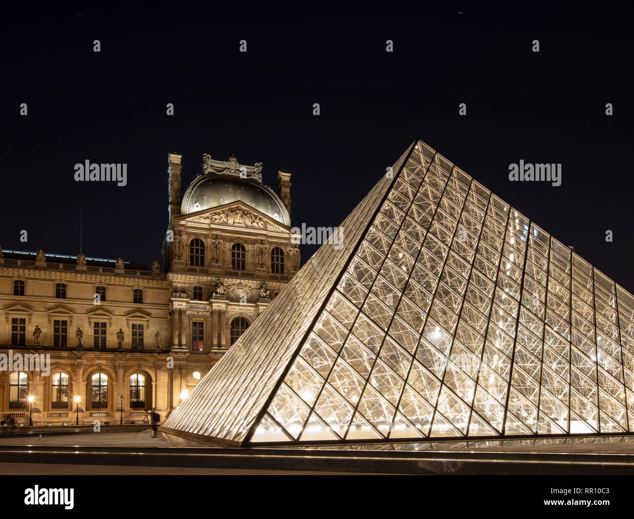 The old Louvre Museum and new Pyramid designed by Pei, Paris, France France. Stock Photo