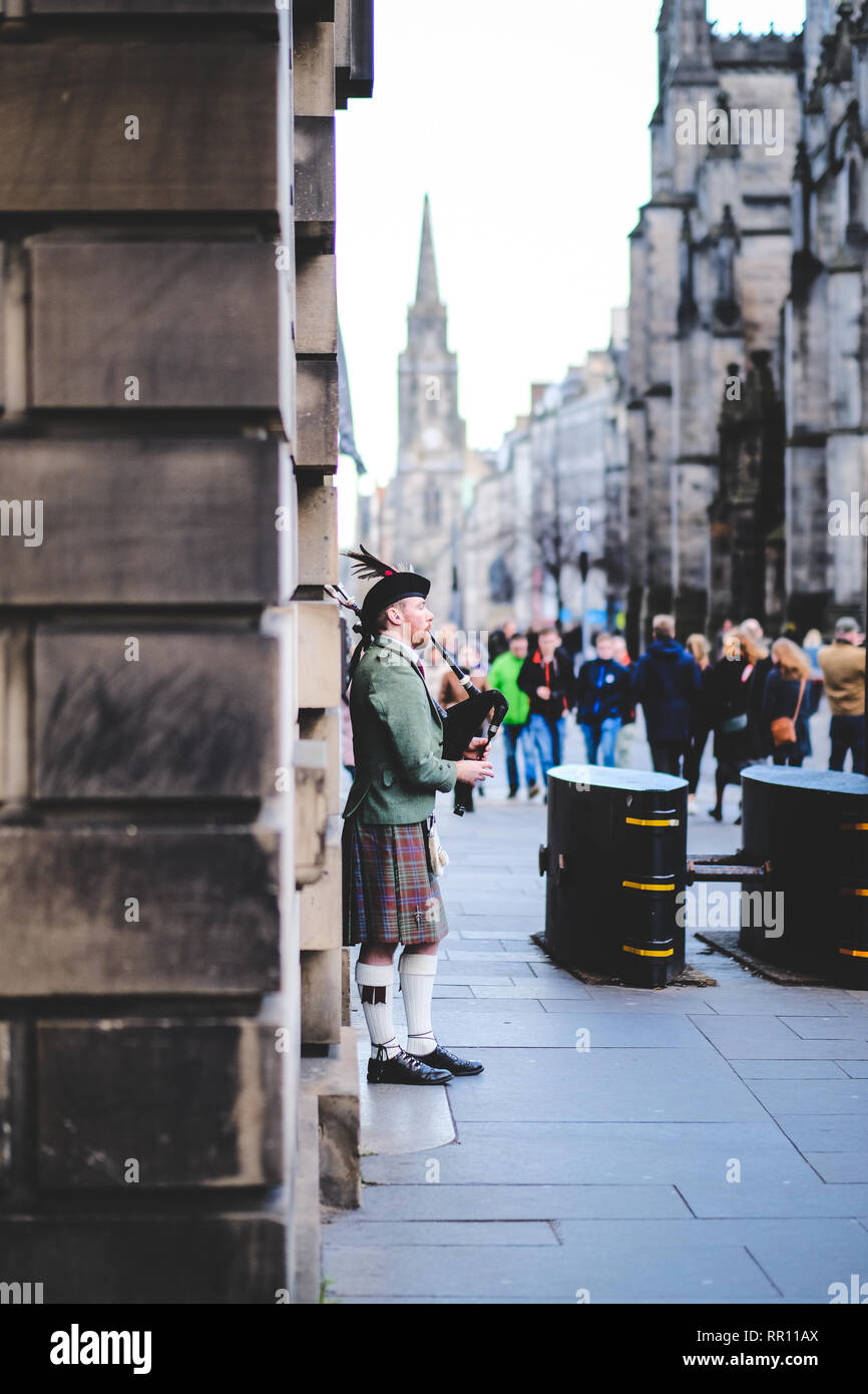Male Bagpipe Player on the streets of Edinburgh, Scotland Stock Photo