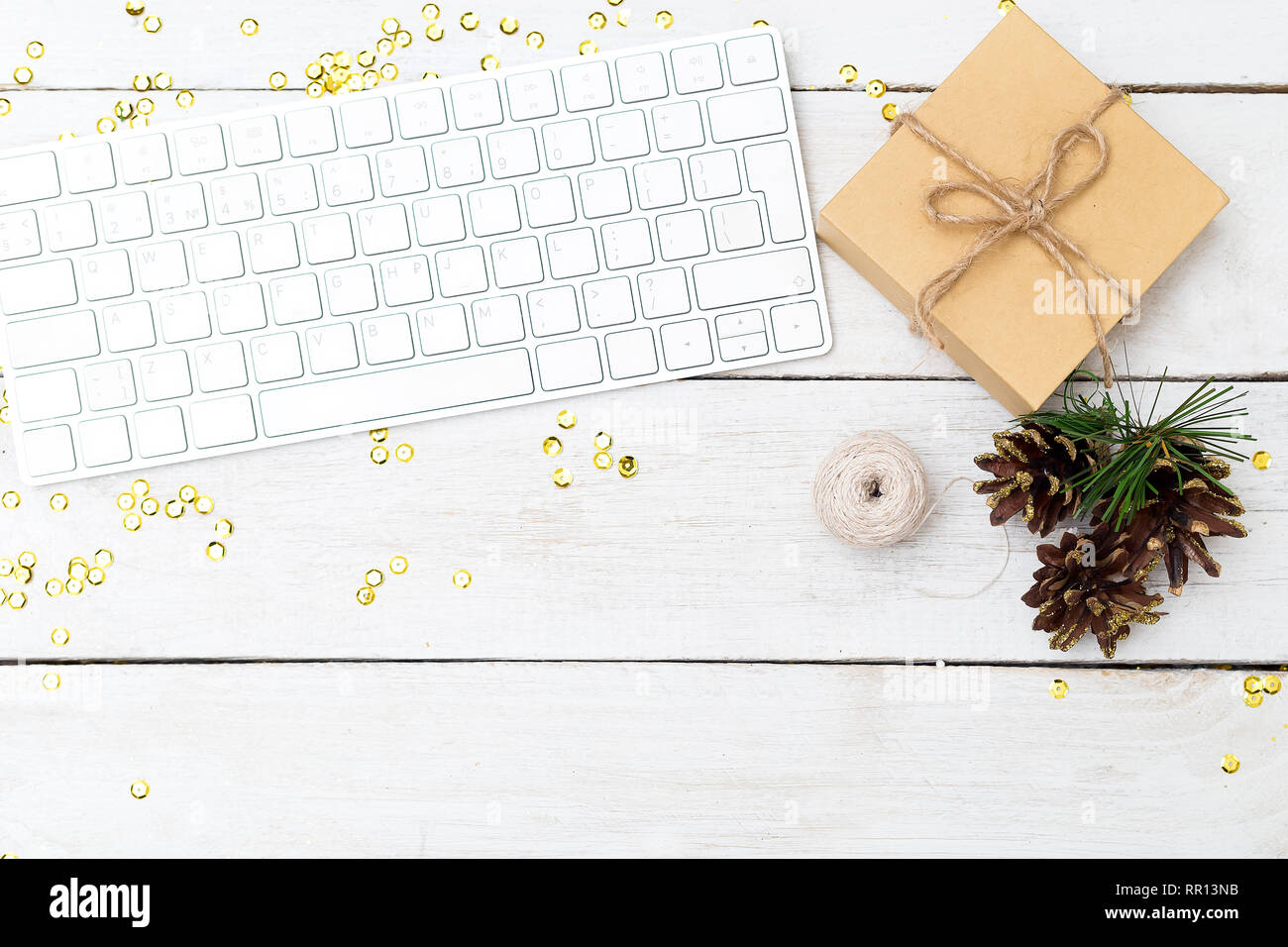 Christmas background. Desktop with keyboard and Christmas decorations