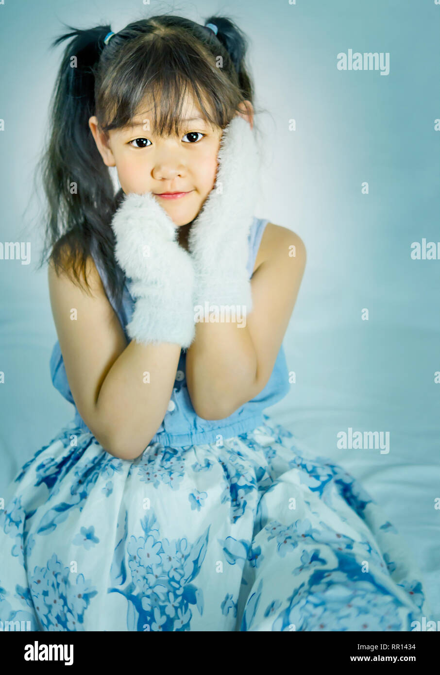 portrait of asian little girl in blue and white dress Stock Photo - Alamy
