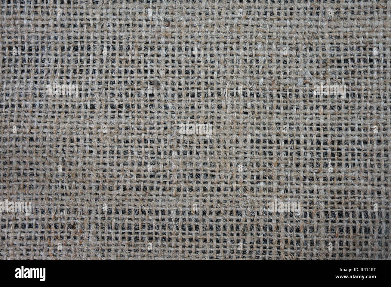 Natural Burlap fabric on a black background Stock Photo