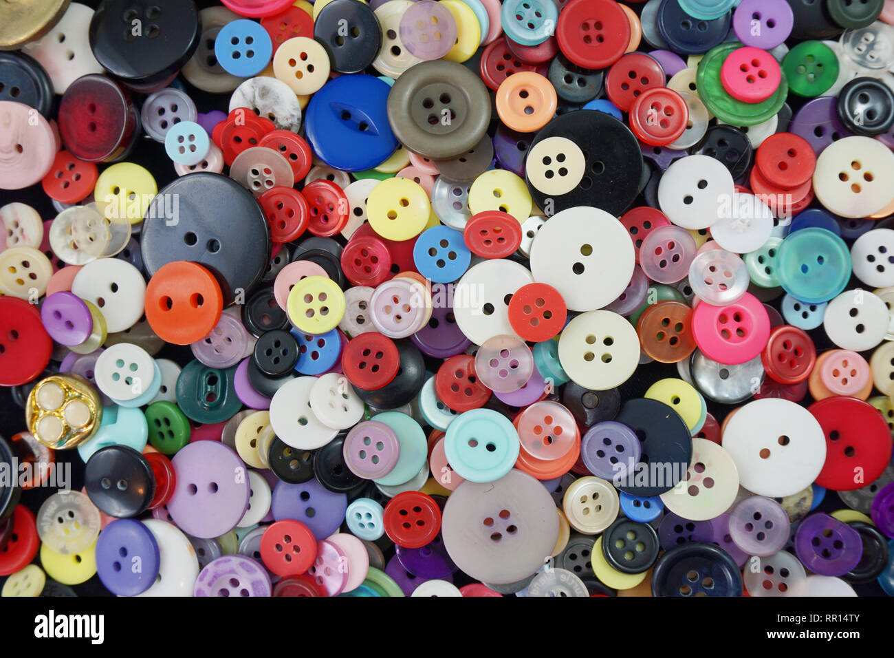 Colorful array of sewing buttons - background Stock Photo - Alamy