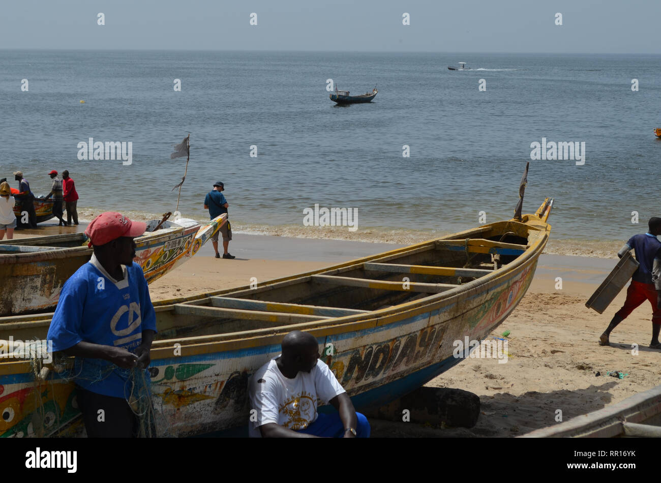 Artisanal pirogues at the beach of Djiffère, Senegal Stock Photo