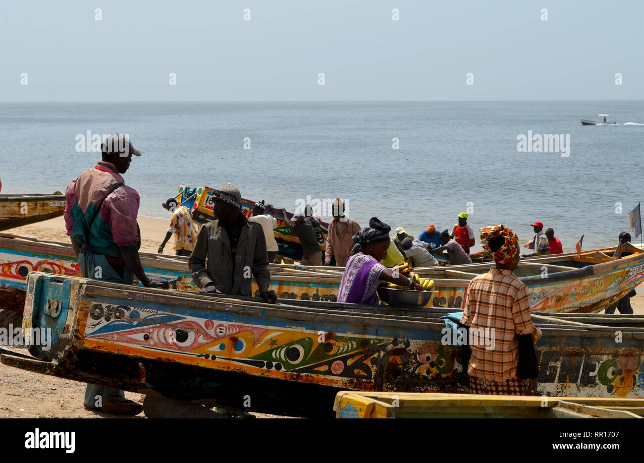 Artisanal pirogues at the beach of Djiffère, Senegal Stock Photo