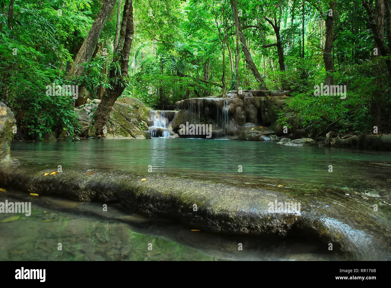 Deep forest waterfall kanchanaburi thailand hi-res stock photography ...