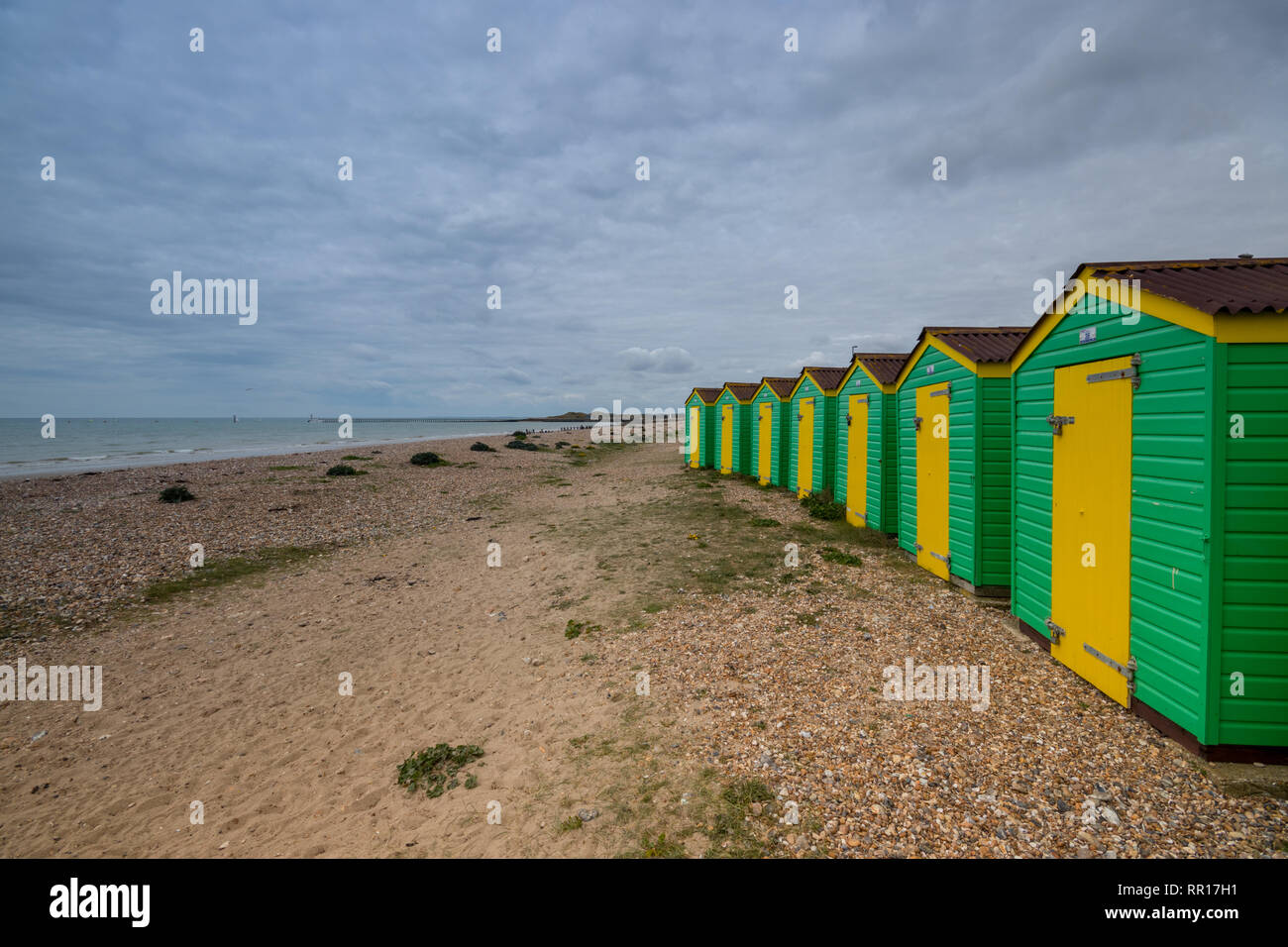 Beach huts near the promenade at Littlehampton, West Sussex, UK Stock