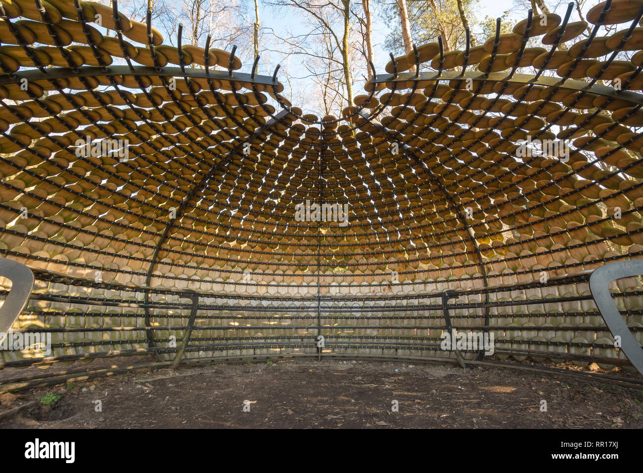 Art installation called Perspectives by Giles Miller in The Hurtwood in the Surrey Hills Area of Outstanding Natural Beauty, UK. Seated pavilion. Stock Photo