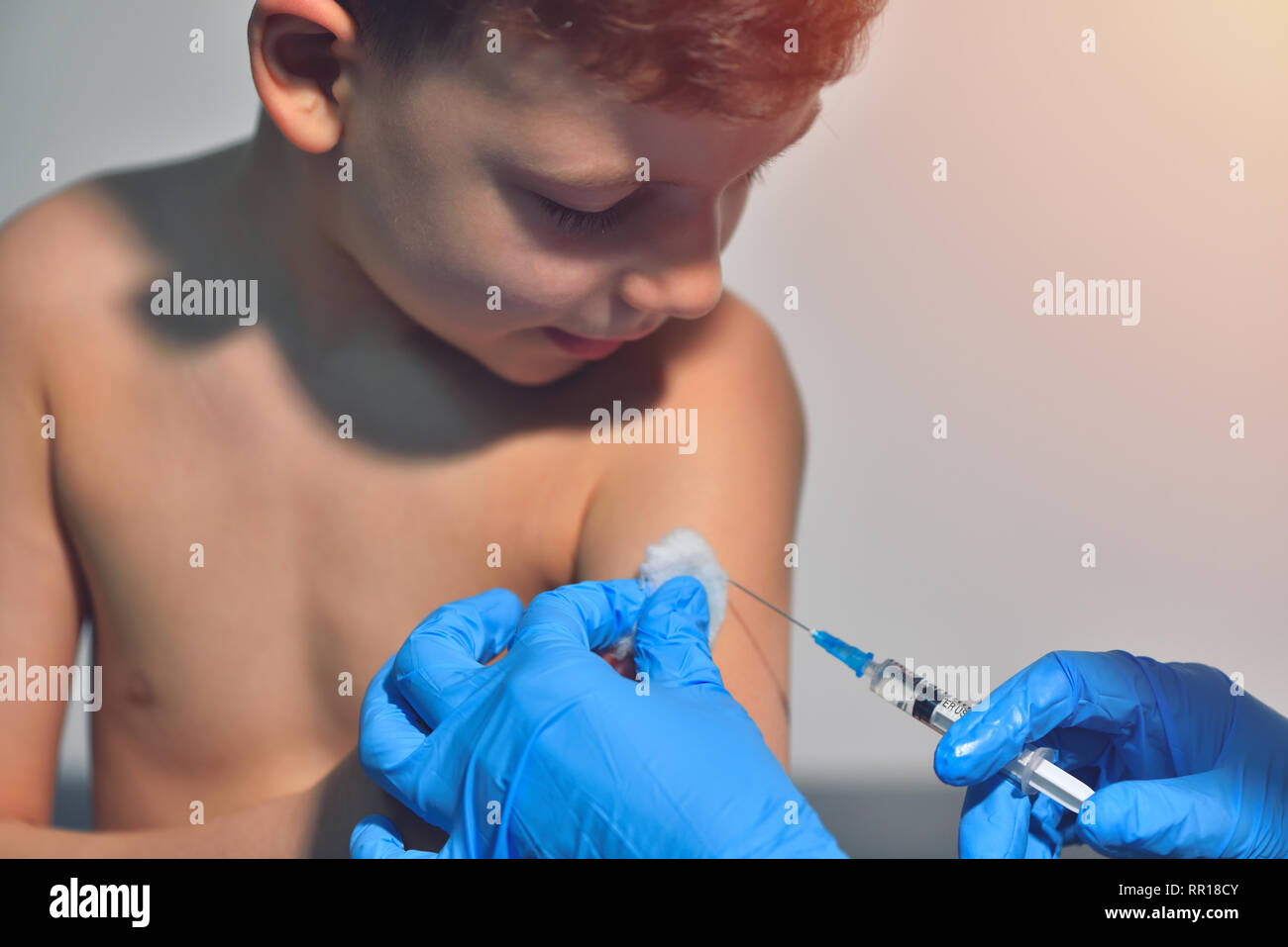 Syringe Injected Close-up hands doctor or nurses are vaccination to patient using the ...
