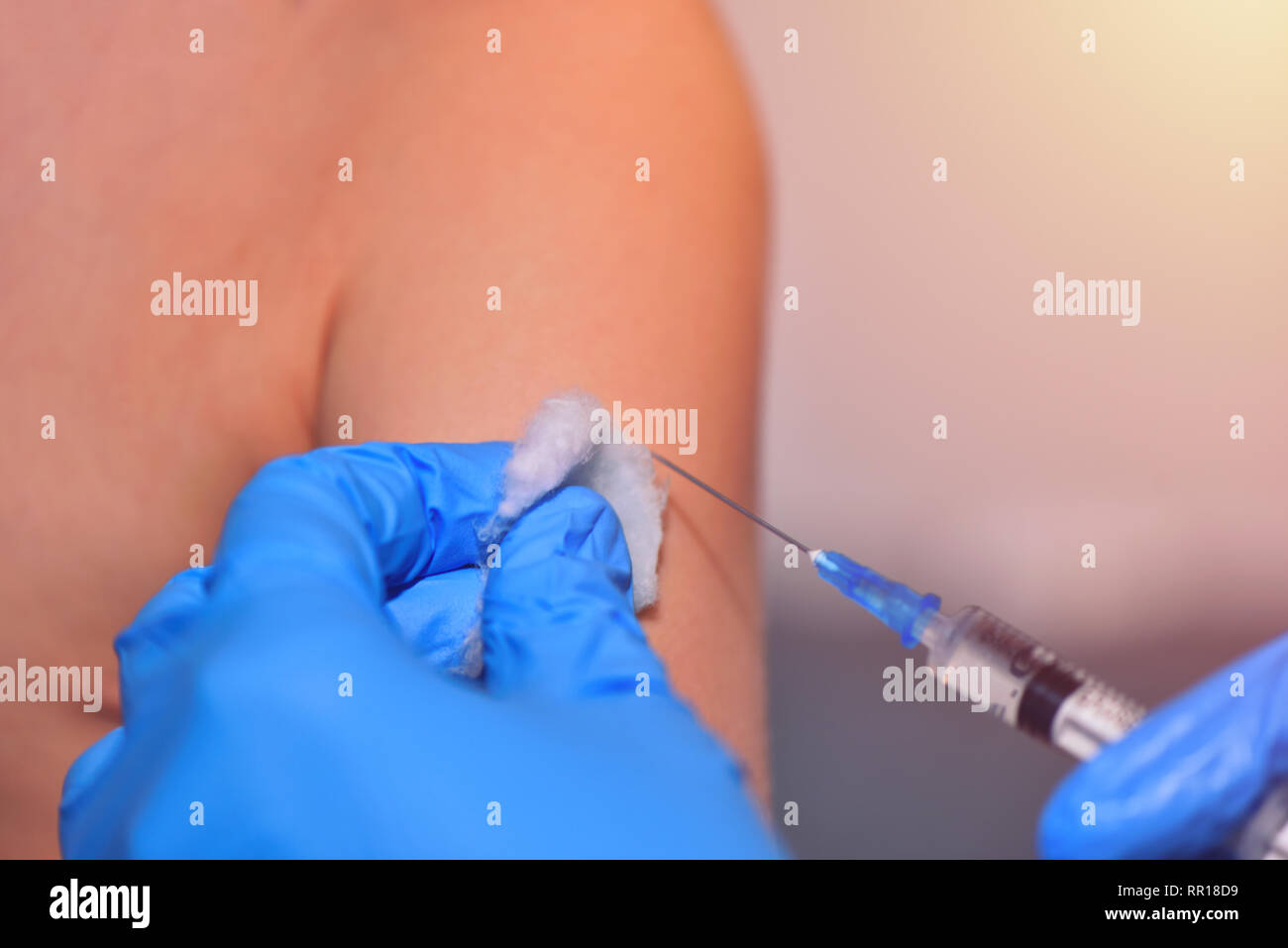 Syringe Injected Close-up hands doctor or nurses are vaccination to patient using the ...