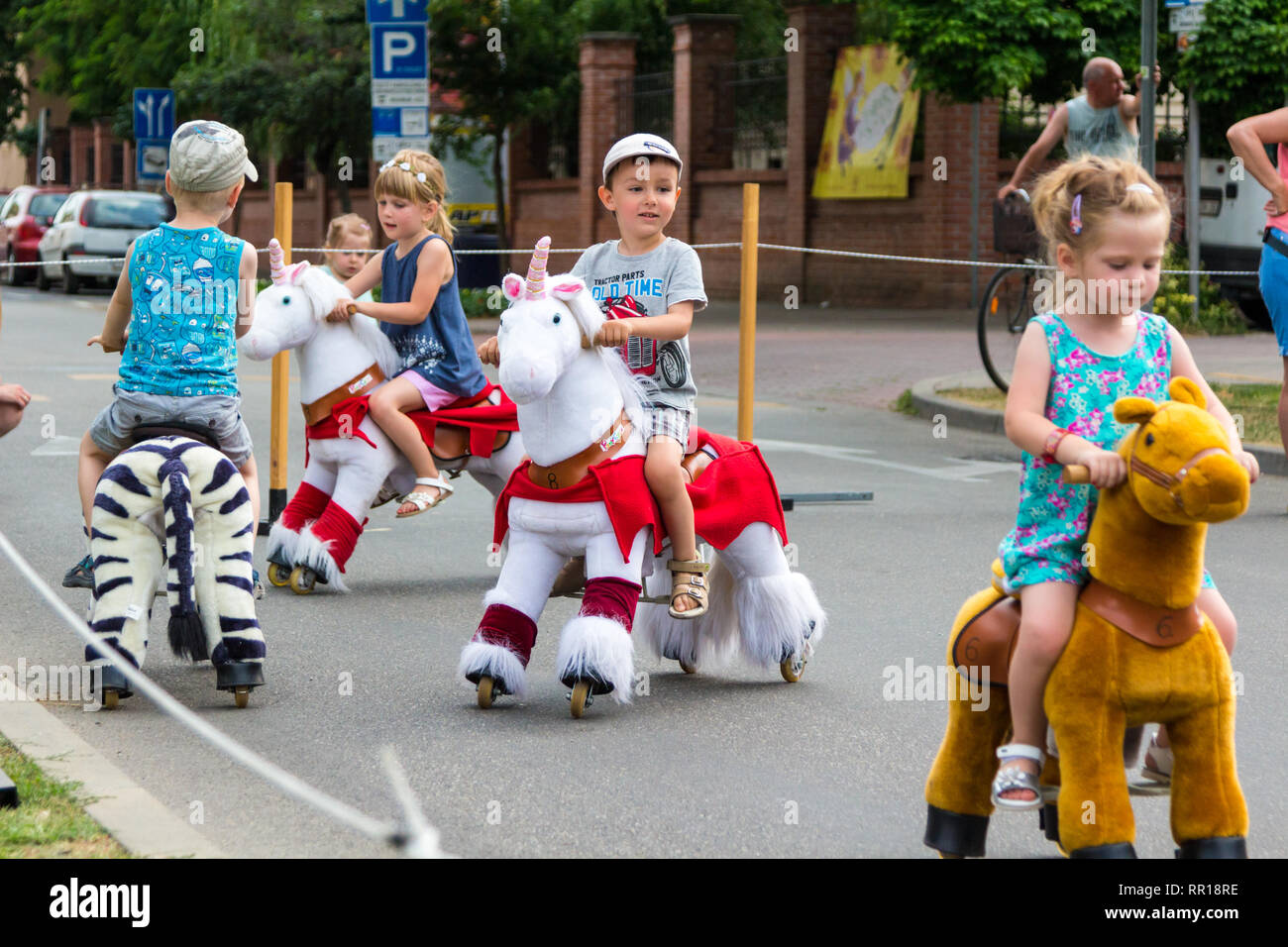 Children ride horse carnival hi-res stock photography and images - Alamy