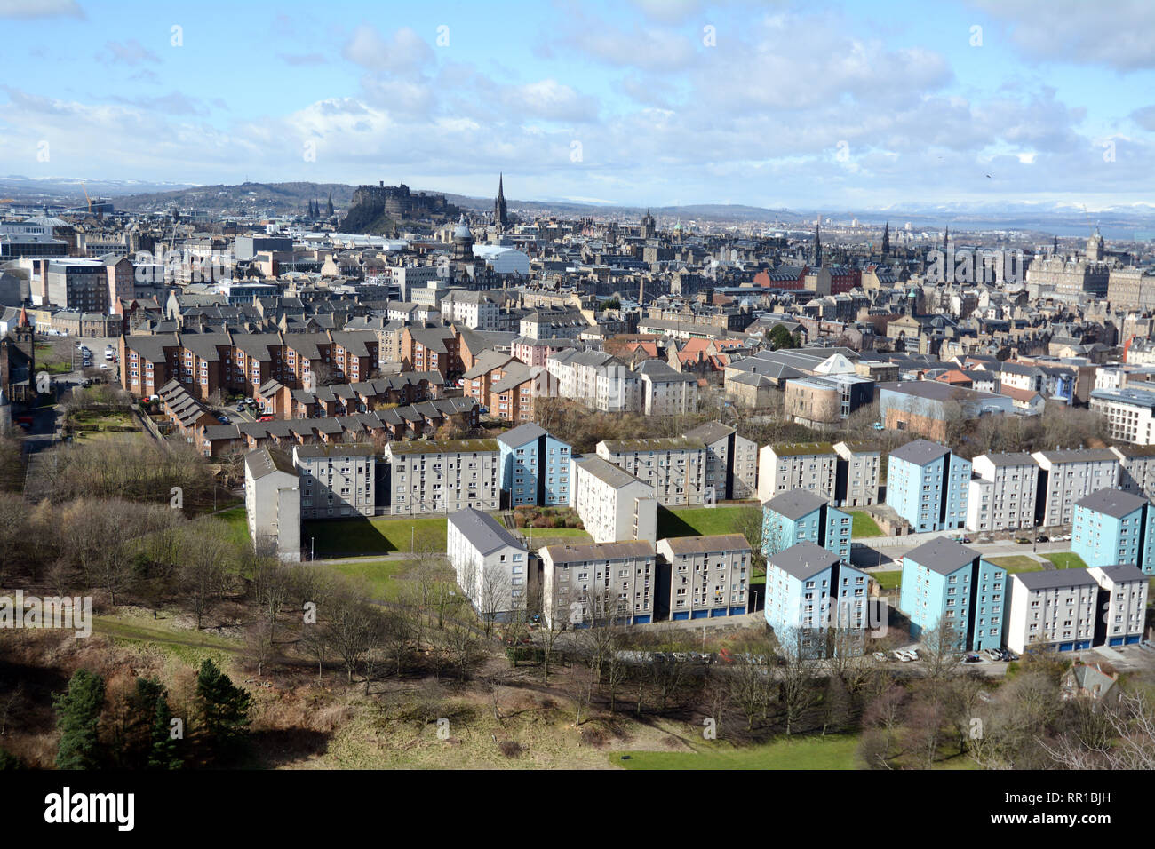 A cityscape view of the medieval old of downtown Edinburgh, and its newer outlying districts, from Arthur's Seat, Scotland, United Kingdom. Stock Photo