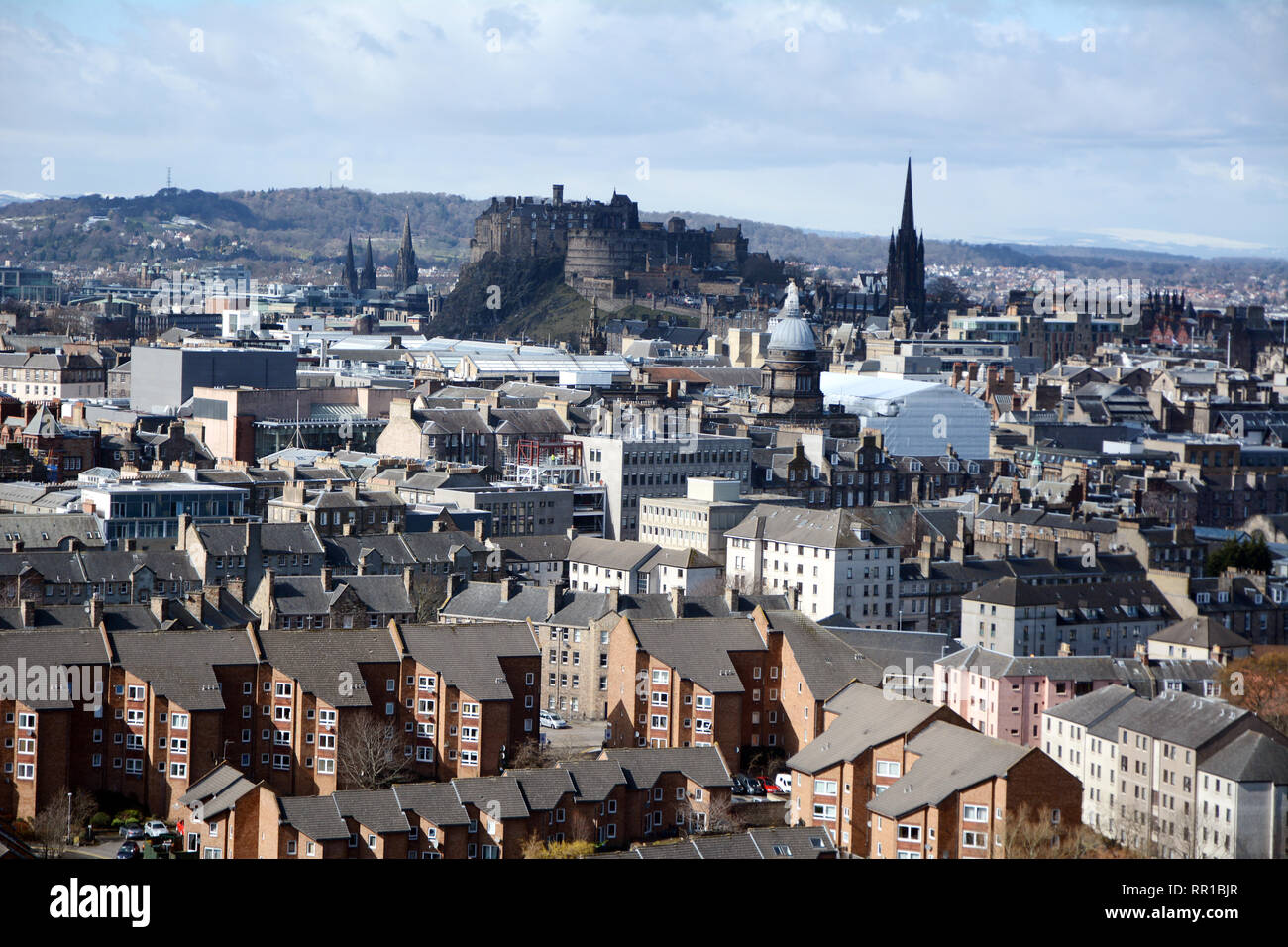 A cityscape view of the medieval old of downtown Edinburgh, and its newer outlying districts, from Arthur's Seat, Scotland, United Kingdom. Stock Photo