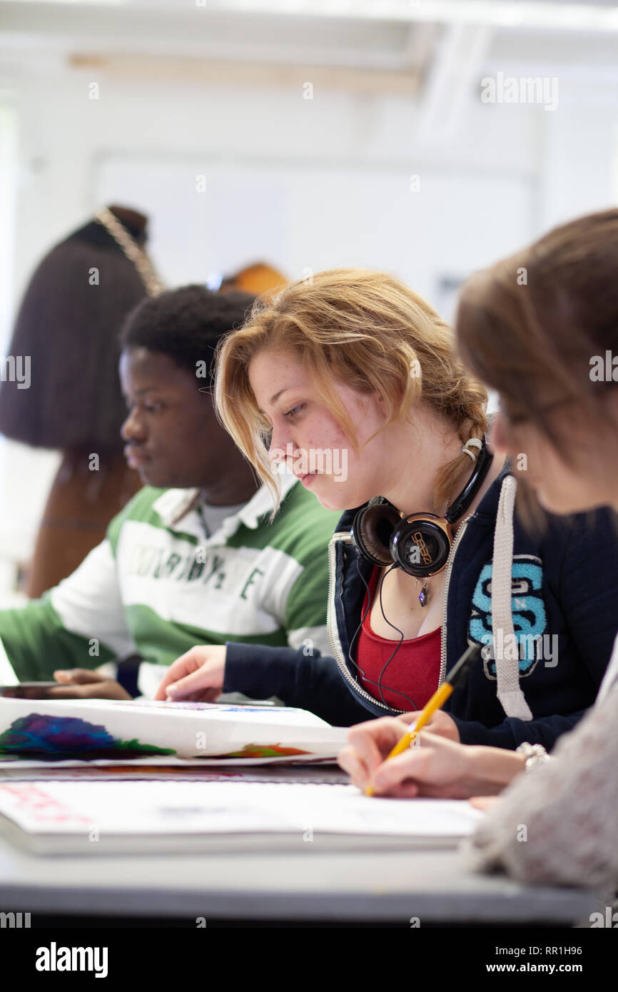 adults in a further education college studying art foundation Stock Photo