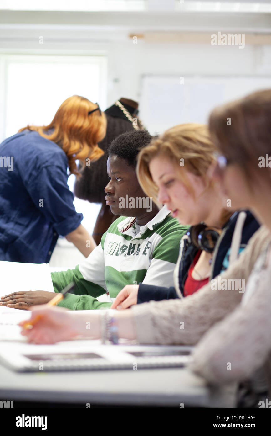 adults in a further education college studying art foundation Stock Photo
