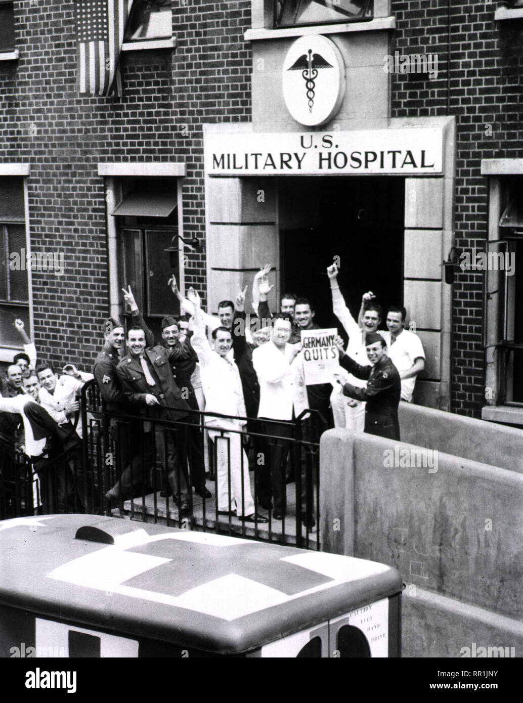 Soldiers celebrating V-E Day at the 150th Station Hospital, London, England ca. 1945 Stock Photo