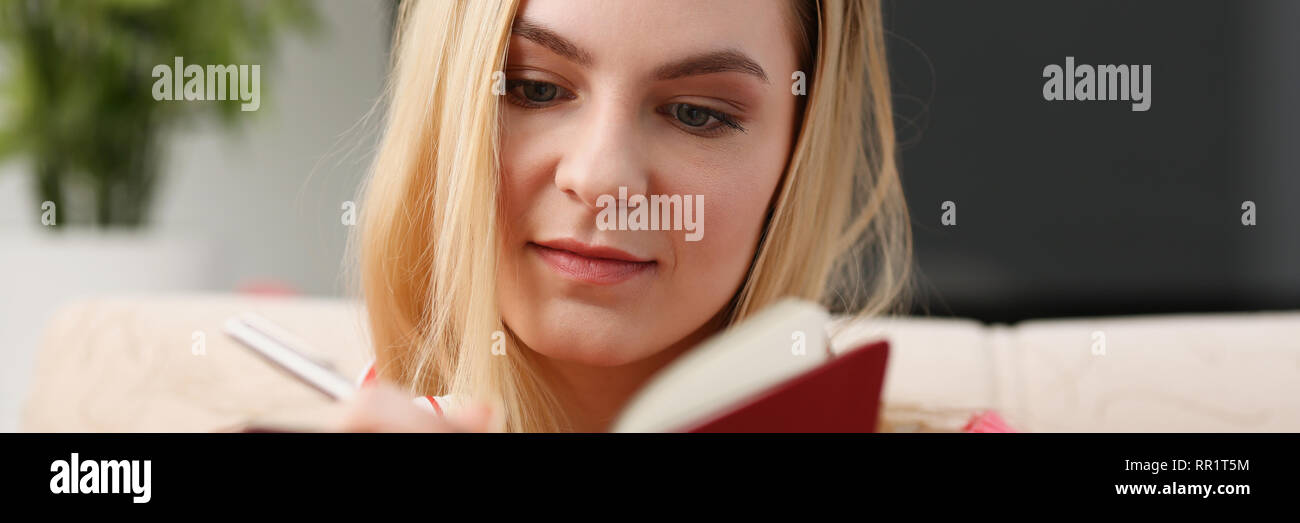 young beautiful woman fill in your personal diary Stock Photo