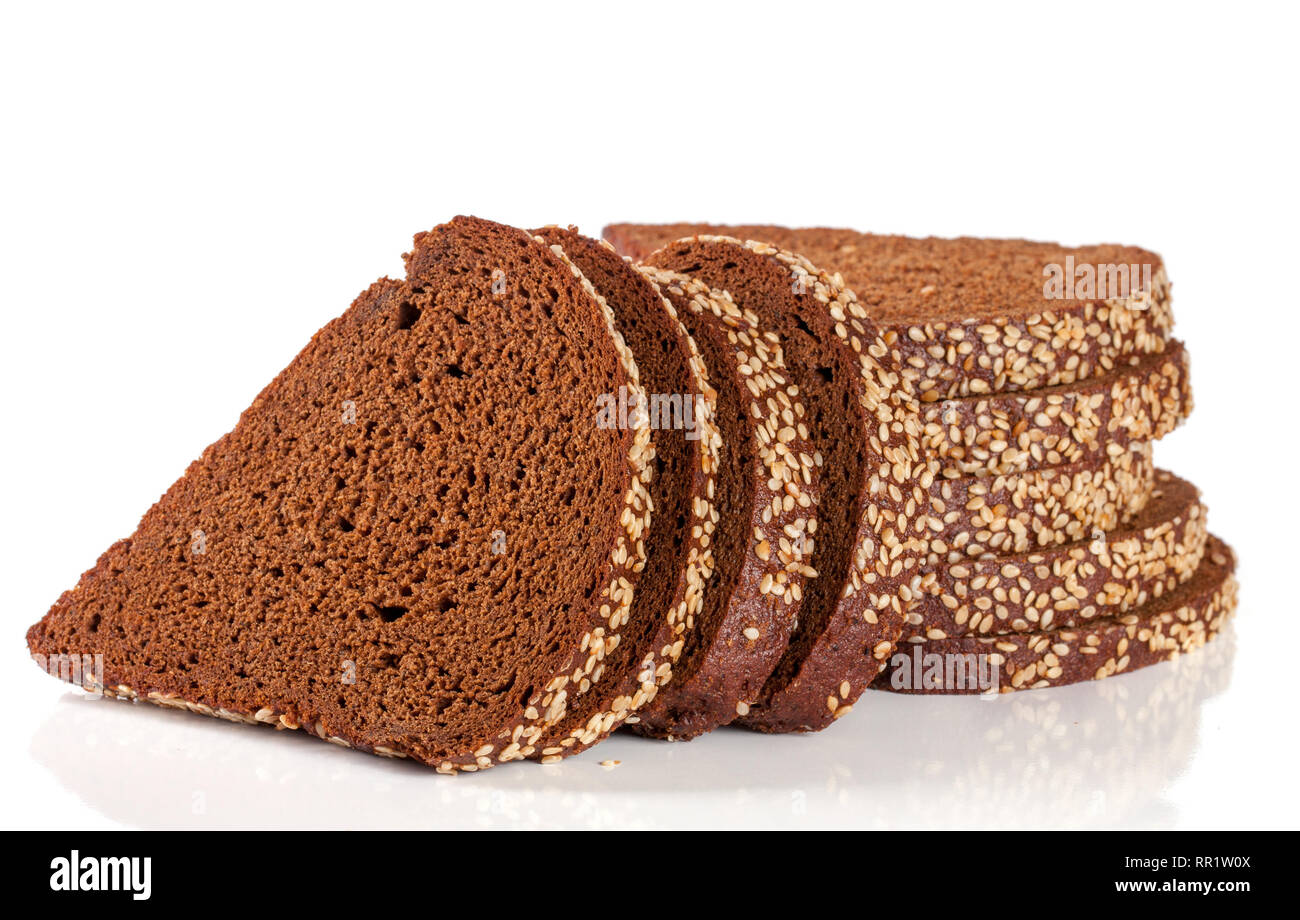 slices of black bread with sesame seeds isolated on white background ...