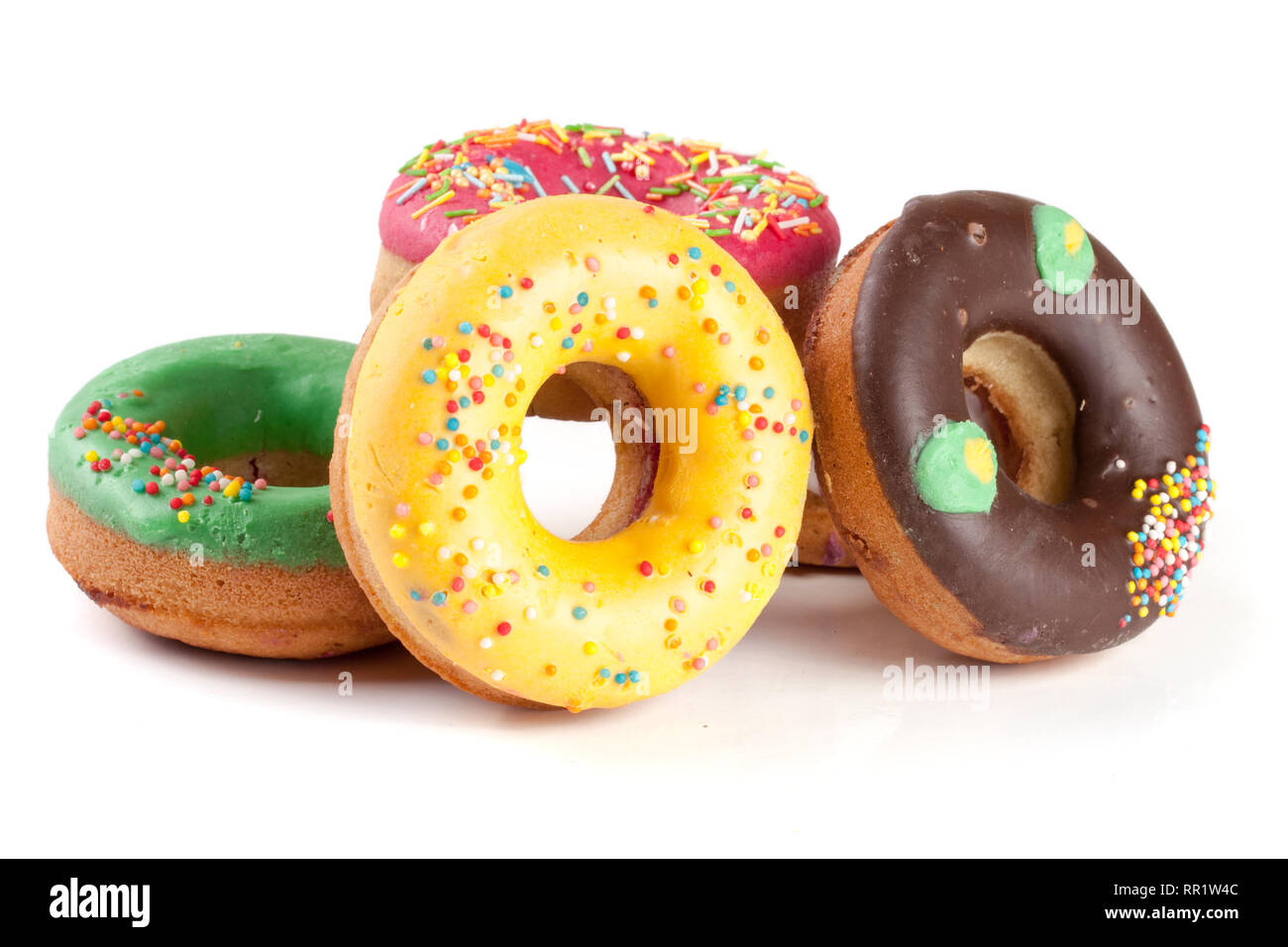 pile of glazed donuts isolated on white background Stock Photo - Alamy