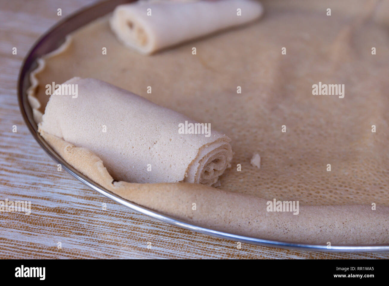 African food. Injera is a sourdough flatbread made from teff flour ...