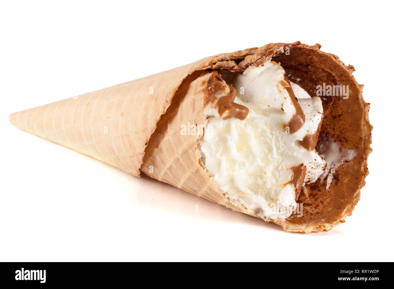 Ice cream cone with caramel isolated on white background Stock Photo ...