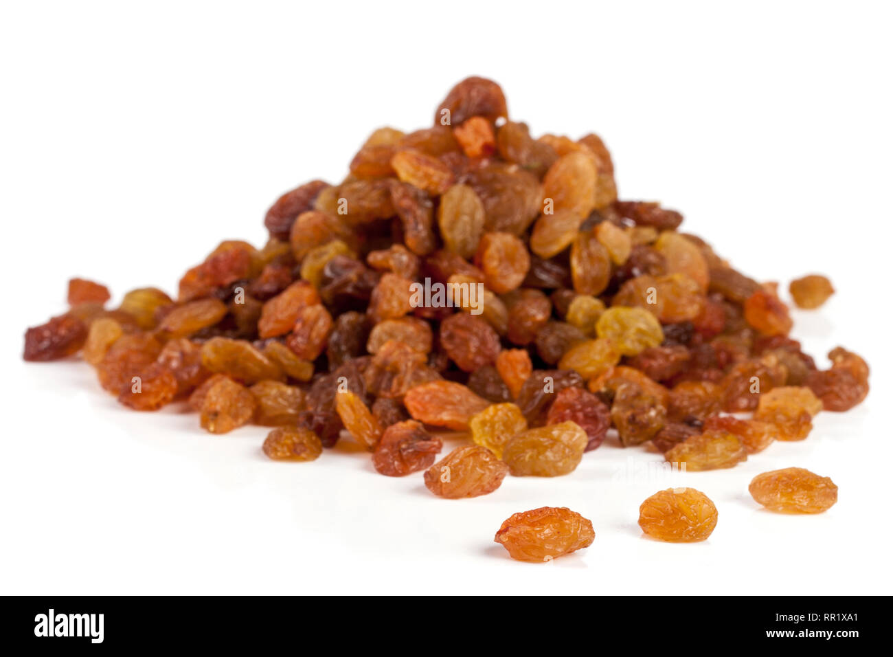 pile of raisins isolated on white background Stock Photo - Alamy