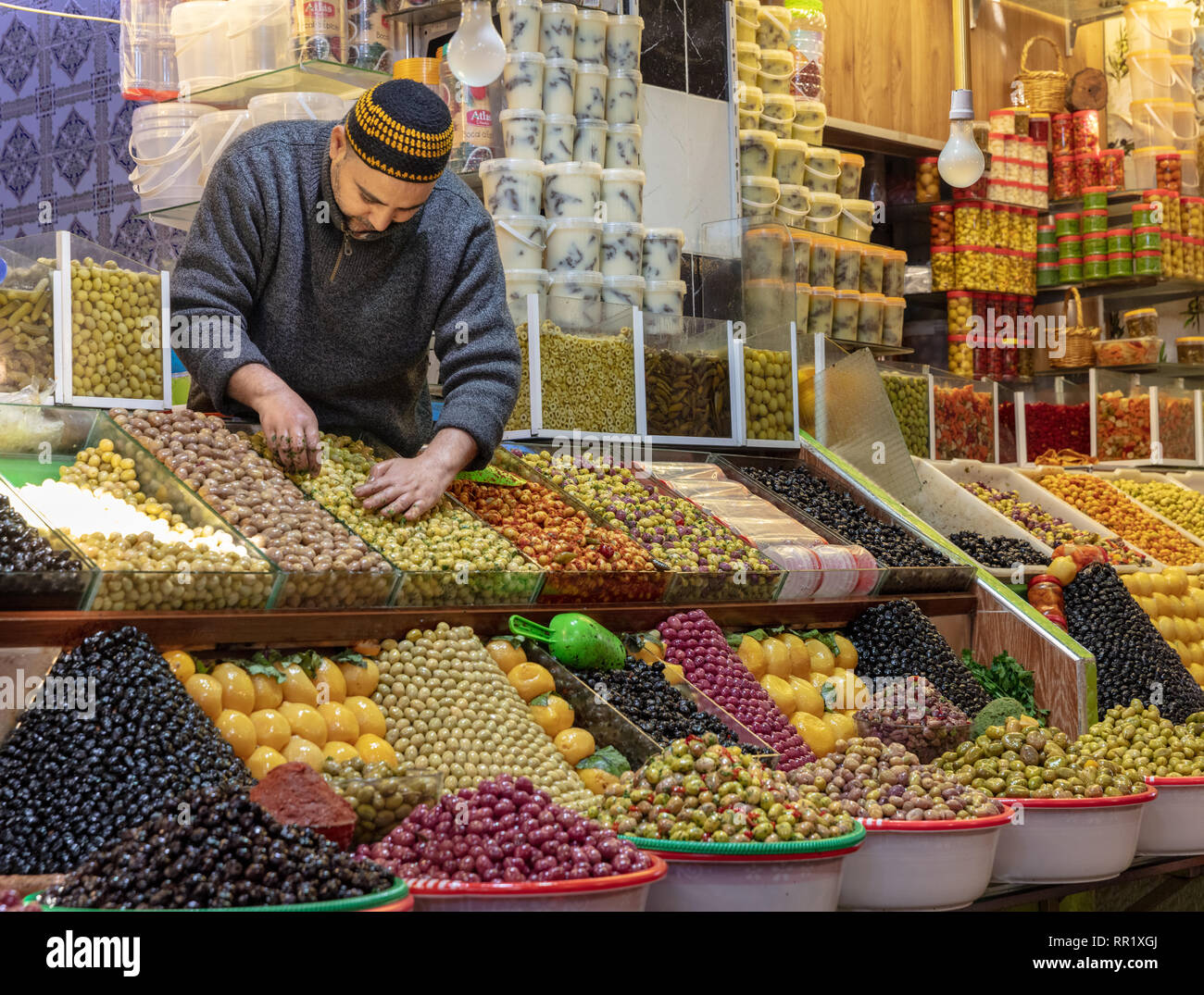 Olive vendor at the Meknes souq, Morocco Stock Photo