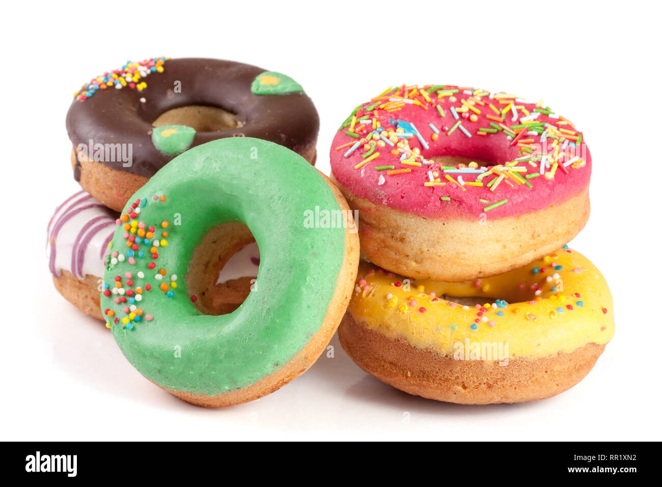 pile of glazed donuts isolated on white background Stock Photo - Alamy