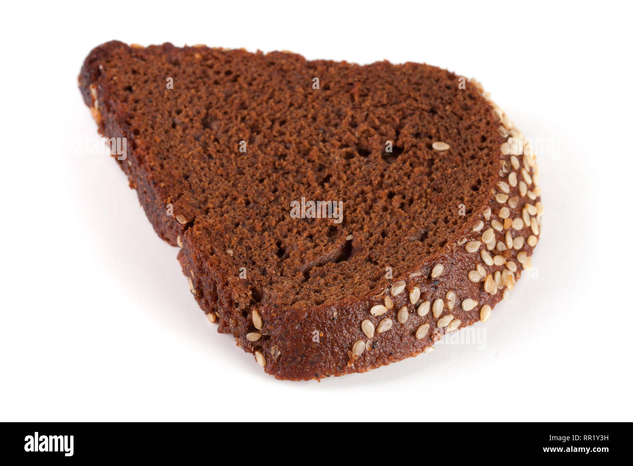 one slice of black bread with sesame seeds isolated on white background ...